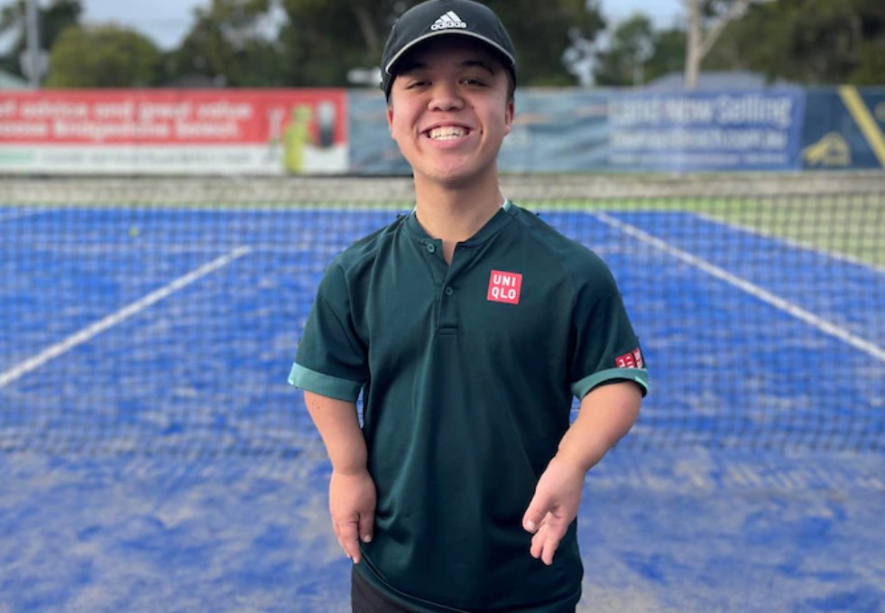 Kai Ryan standing on a tennis court