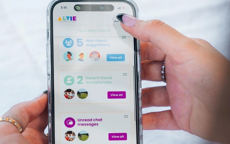 somebody using the alvie app on their phone