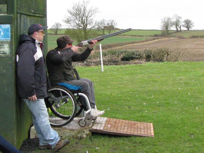 man in a wheelchair clay pigeon shooting