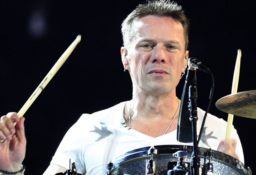 U2's Larry Mullen says he risked paralysis staying in the band