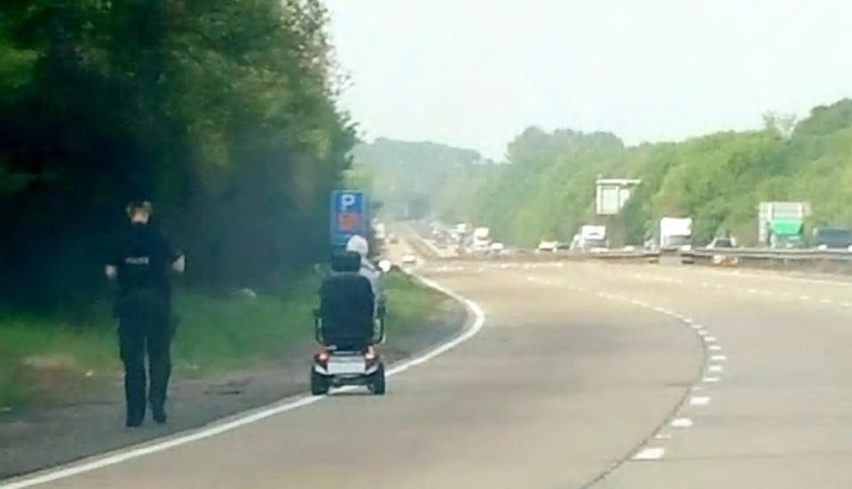 Woman rides mobility scooter down dual carriageway